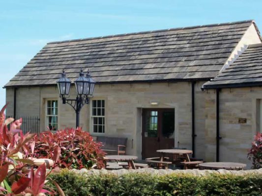 New roof using reclaimed stone roof slates